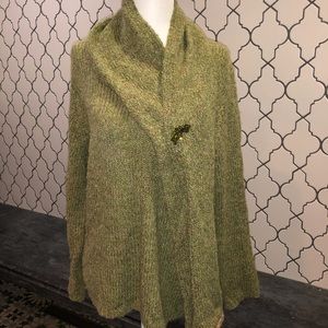 V-neck sweater w/matching scarf and brooch.